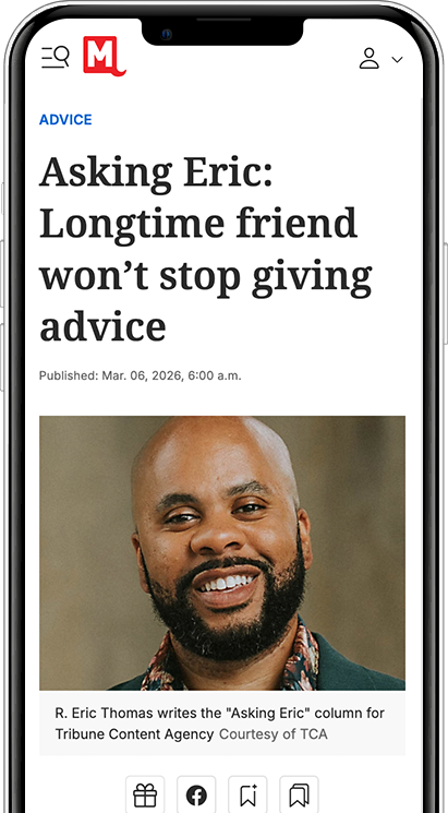 mobile phone with image of news article
