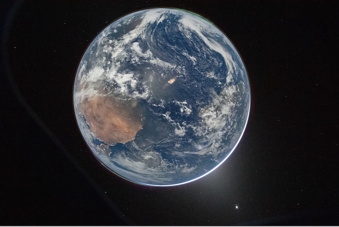 NASA astronaut and Artemis II Commander Reid Wiseman took this picture of Earth from the Orion spacecraft's window on April 2, after completing the translunar injection burn. Reid Wiseman/NASA