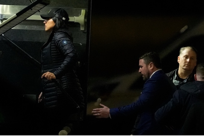 Director of National Intelligence Tulsi Gabbard and FBI Deputy Director Andrew Bailey enter a command vehicle, as the FBI seizes 2020 election ballots at a Georgia election center on Wednesday. Mike Stewart/AP