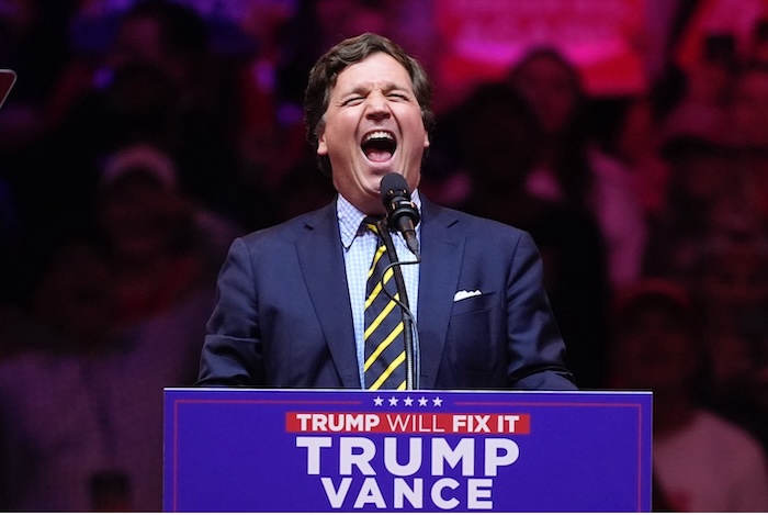 Tucker Carlson speaks at a campaign rally for Donald Trump at Madison Square Garden on October 27, 2024, in New York City. Evan Vucci/AP