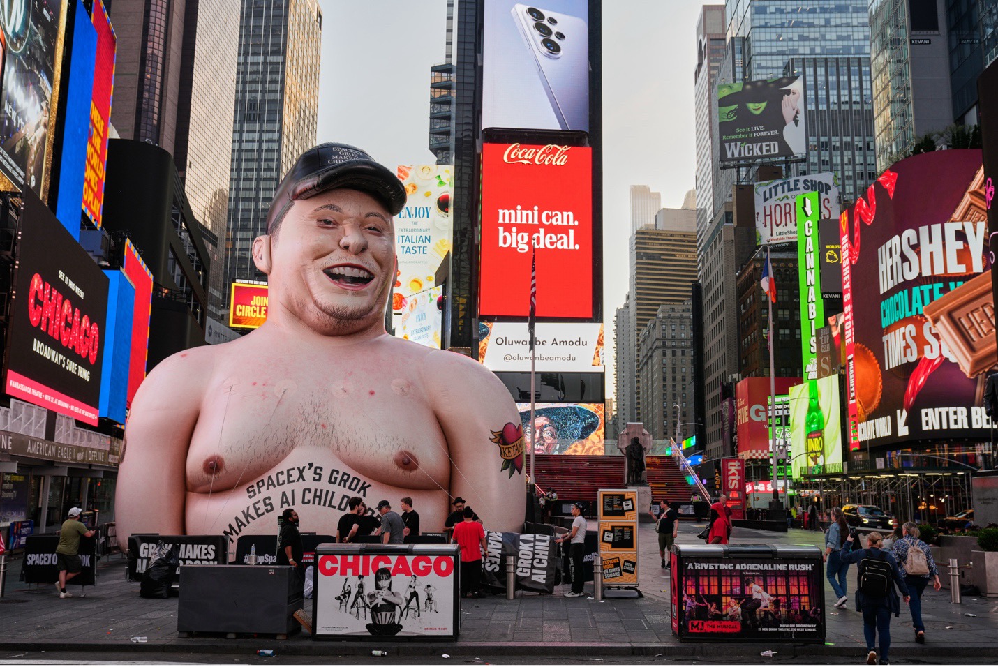 A large inflatable figure depicting Elon Musk in Times Square in New York on Thursday. Seth Wenig/AP