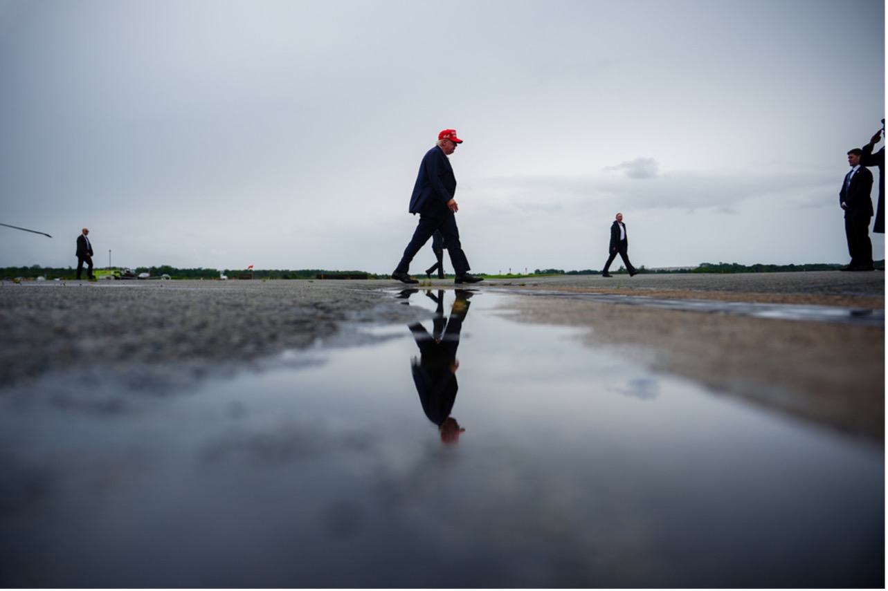 President Donald Trump walks to Air Force One at Morristown Airport in New Jersey on Sunday. Julia Demaree Nikhinson/AP
