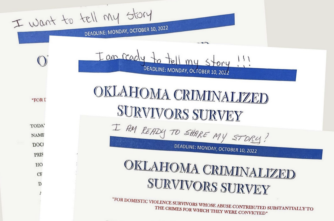 A stack of surveys with the title “OKLAHOMA CRIMINALIZED SURVIVORS SURVEY” printed on letter paper with handwritten notes in the top margin indicating enthusiastic desire to share personal stories.