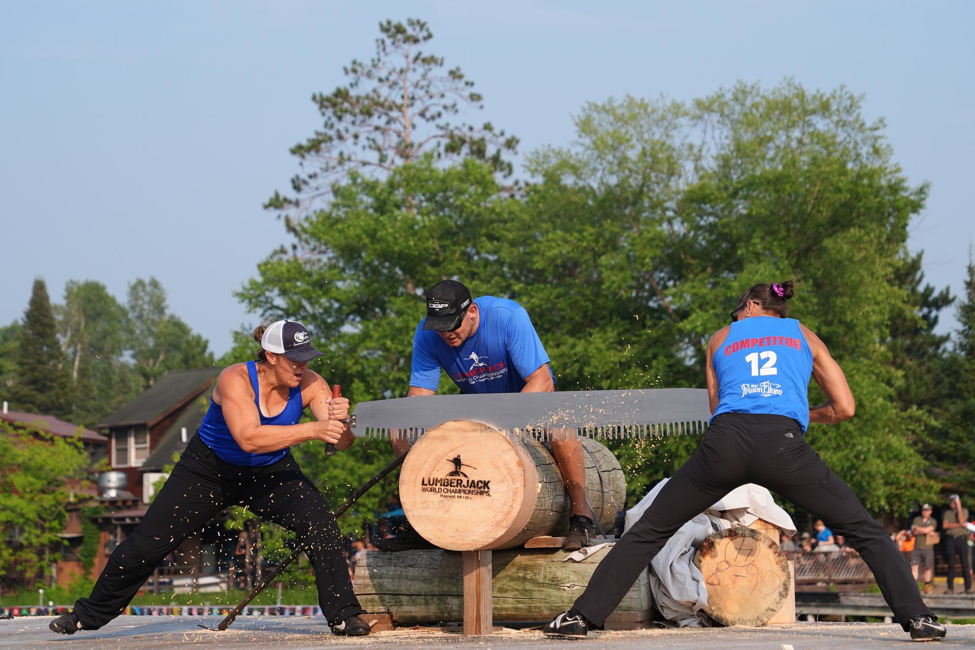 Kate Witkowski, left, and Erin Lavoie compete in the Lumberjack World Championships, Saturday, in Hayward, Wis. 