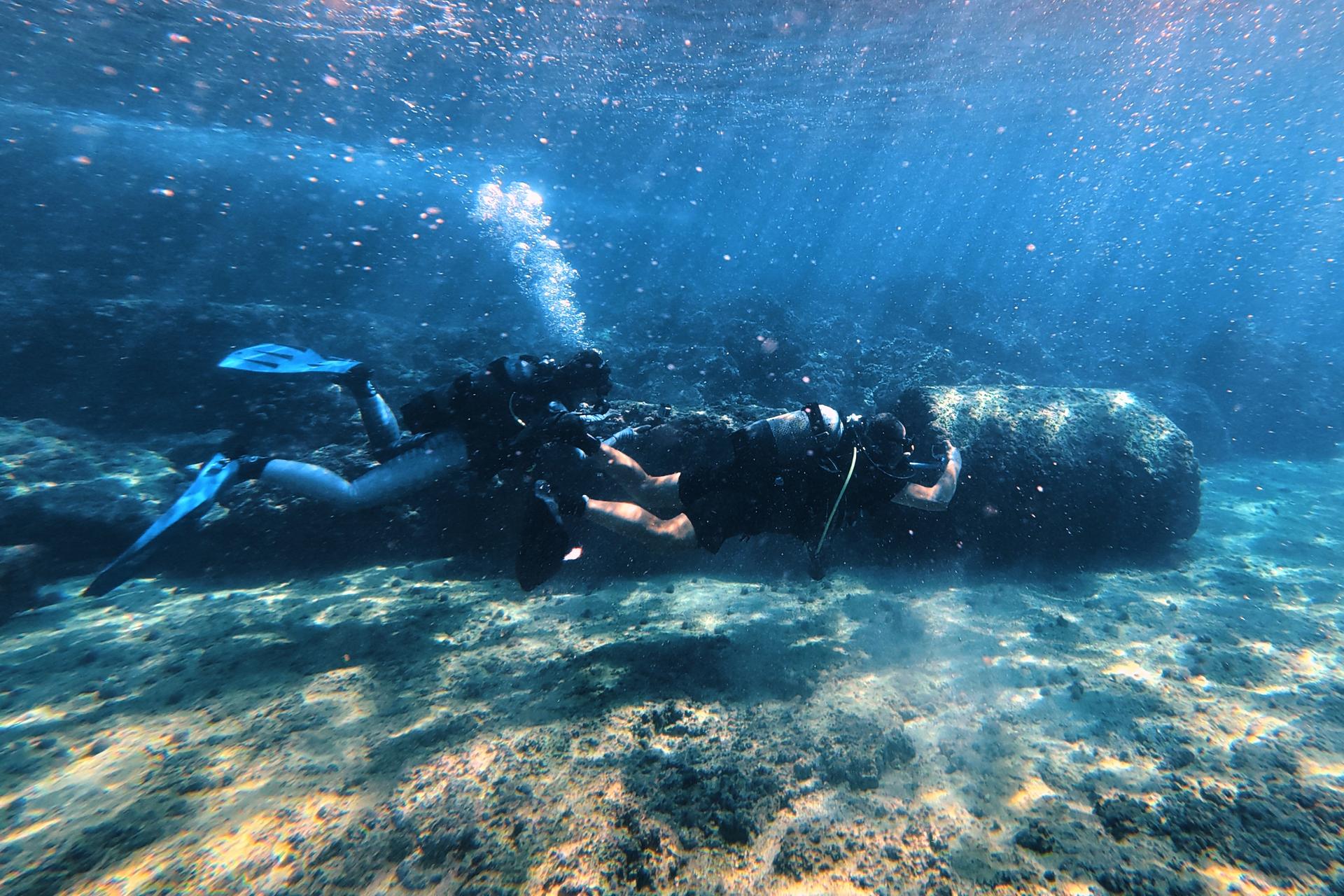 Lebanon Diving Center manager Youssef Jundi films Roman-era columns at an underwater archaeological site near the coast of Tyre, Lebanon, Sept. 17. 