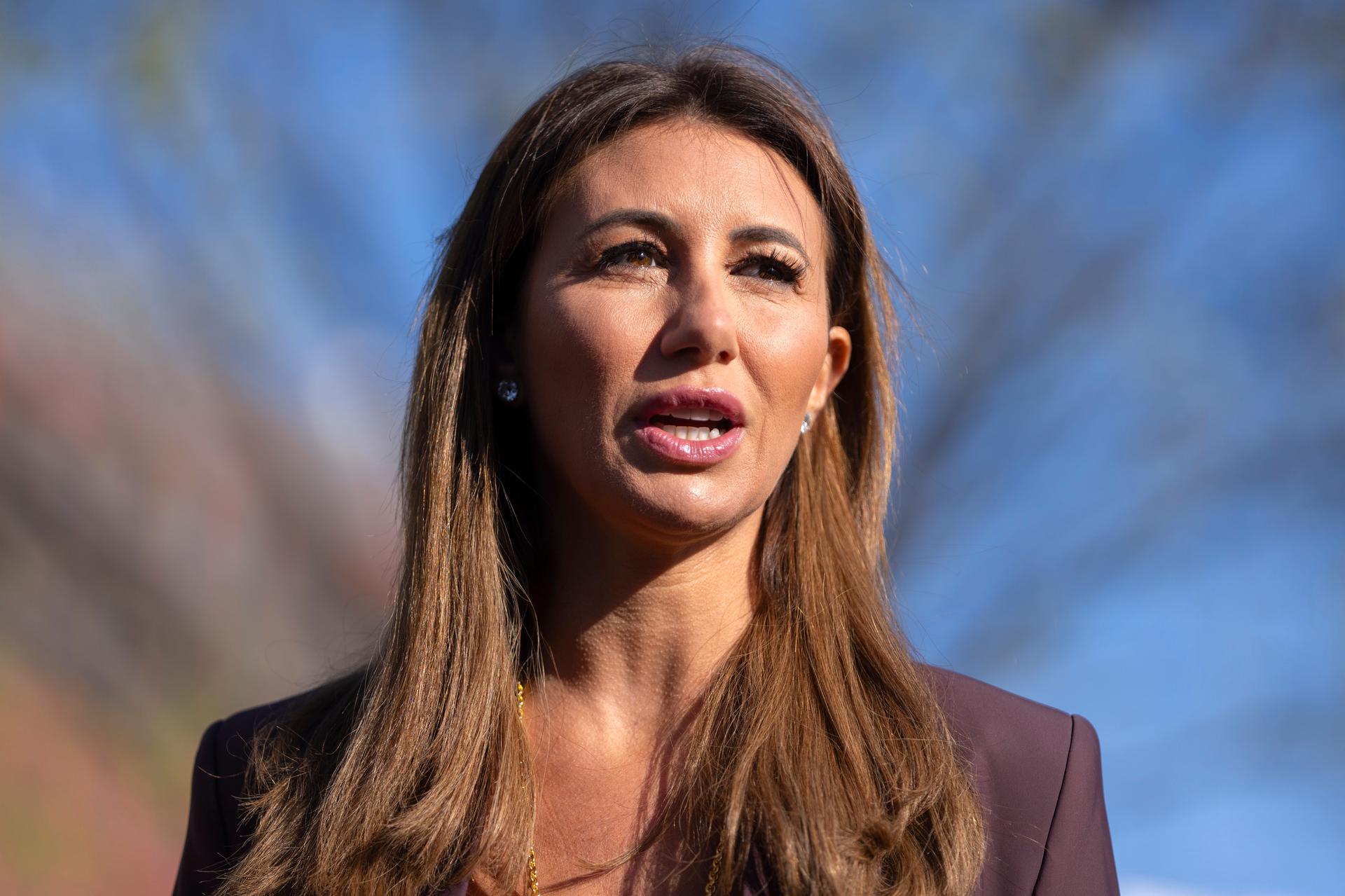 Alina Habba speaks with reporters outside the White House in March. (AP Photo/Mark Schiefelbein)