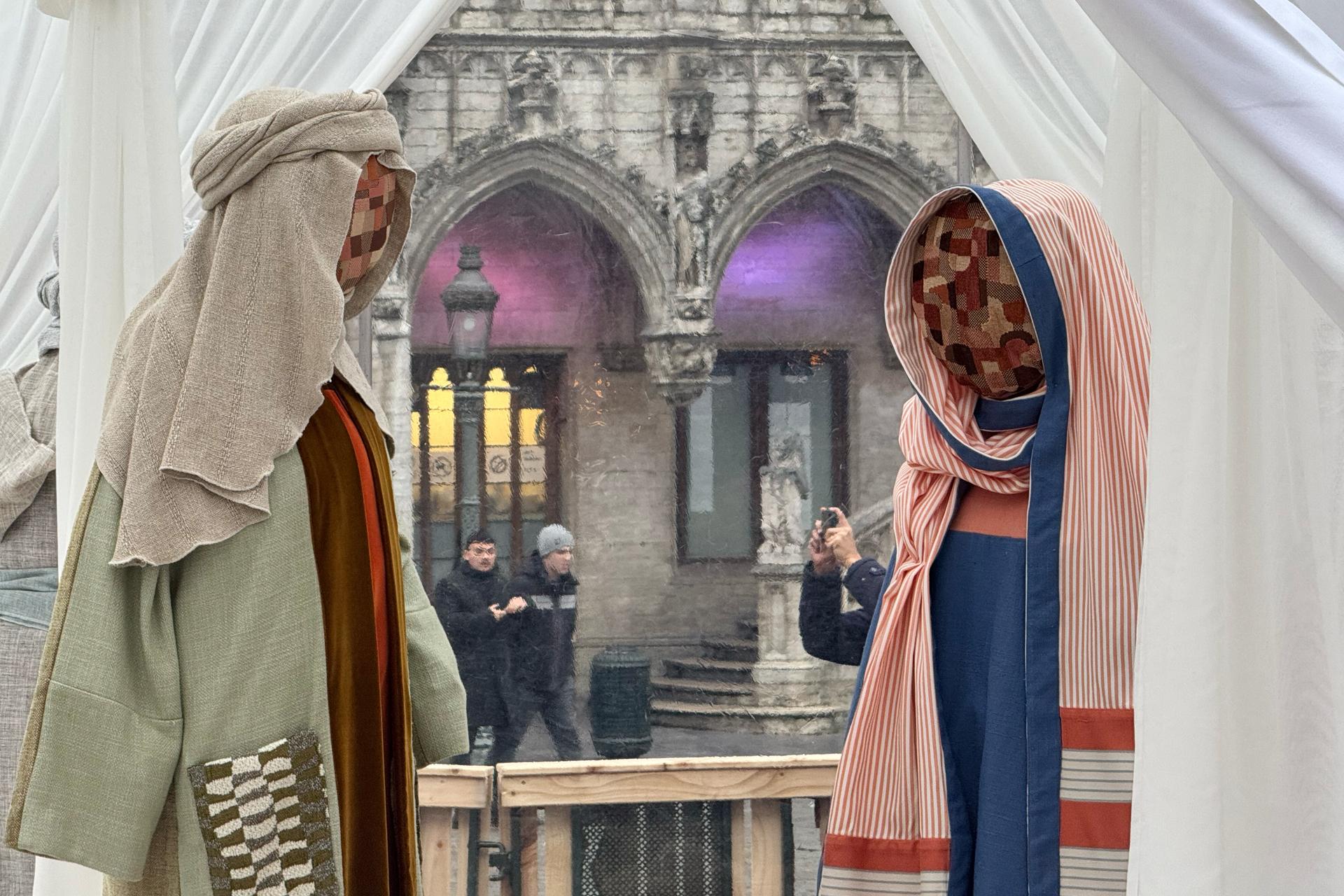 A Nativity scene containing characters with cloth faces is displayed in Brussels on Monday. (AP Photo/Sylvain Plazy)