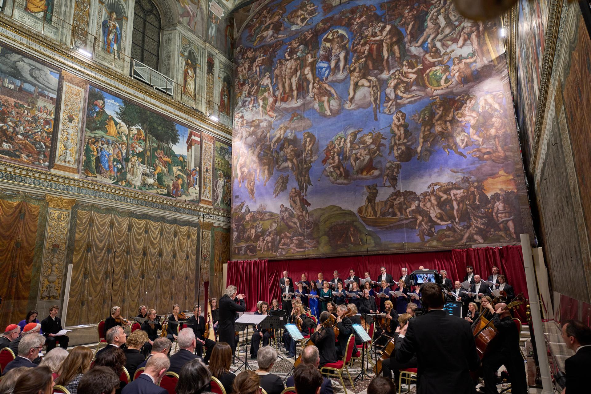 The Sixteen perform 'Angels Unawares' by James MacMillan, conducted by Harry Christopher, in the Sistine Chapel at the Vatican Sunday.
