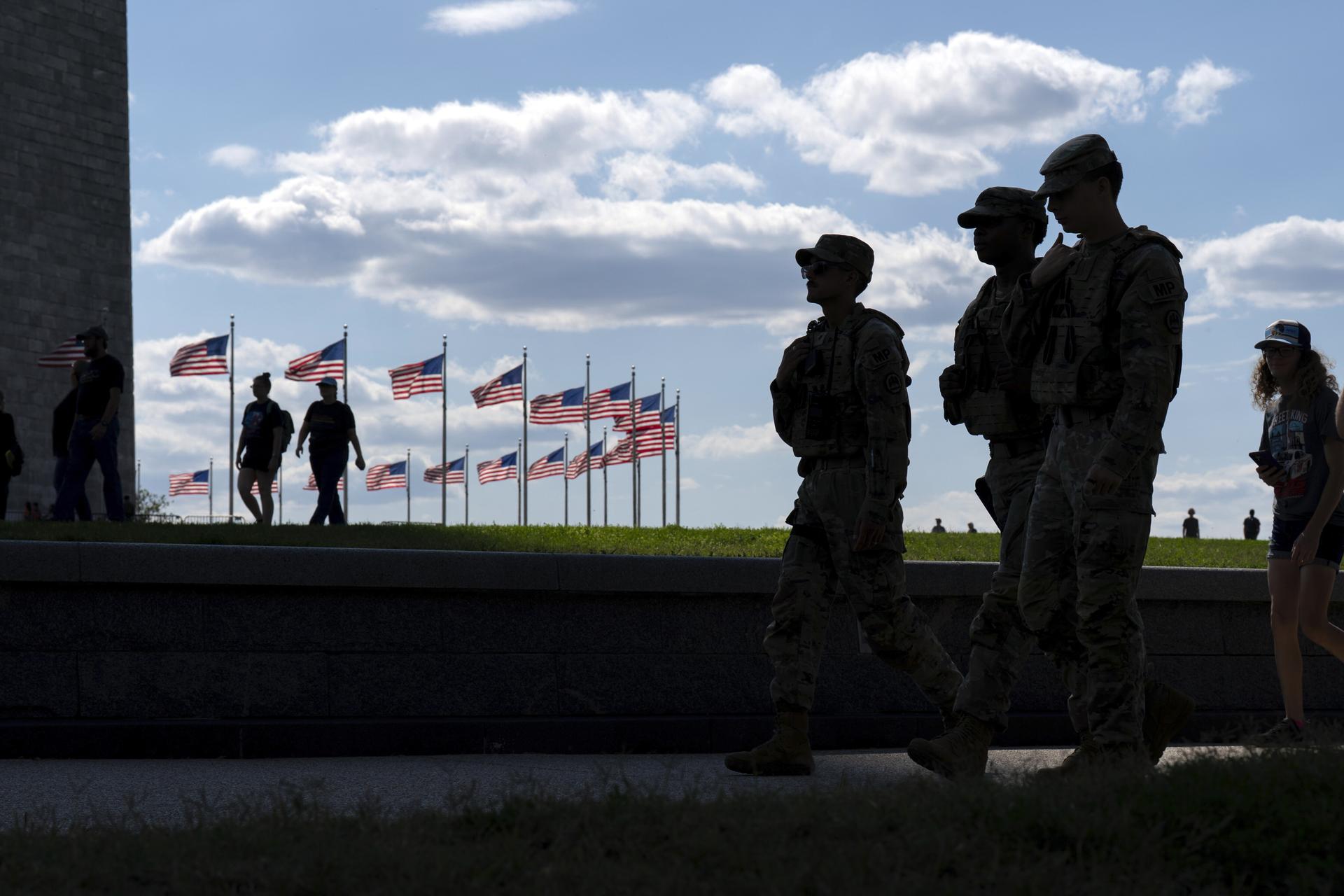 Members of the Louisiana National Guard patrol the National Mall on Sunday. (AP Photo/Jose Luis Magana)