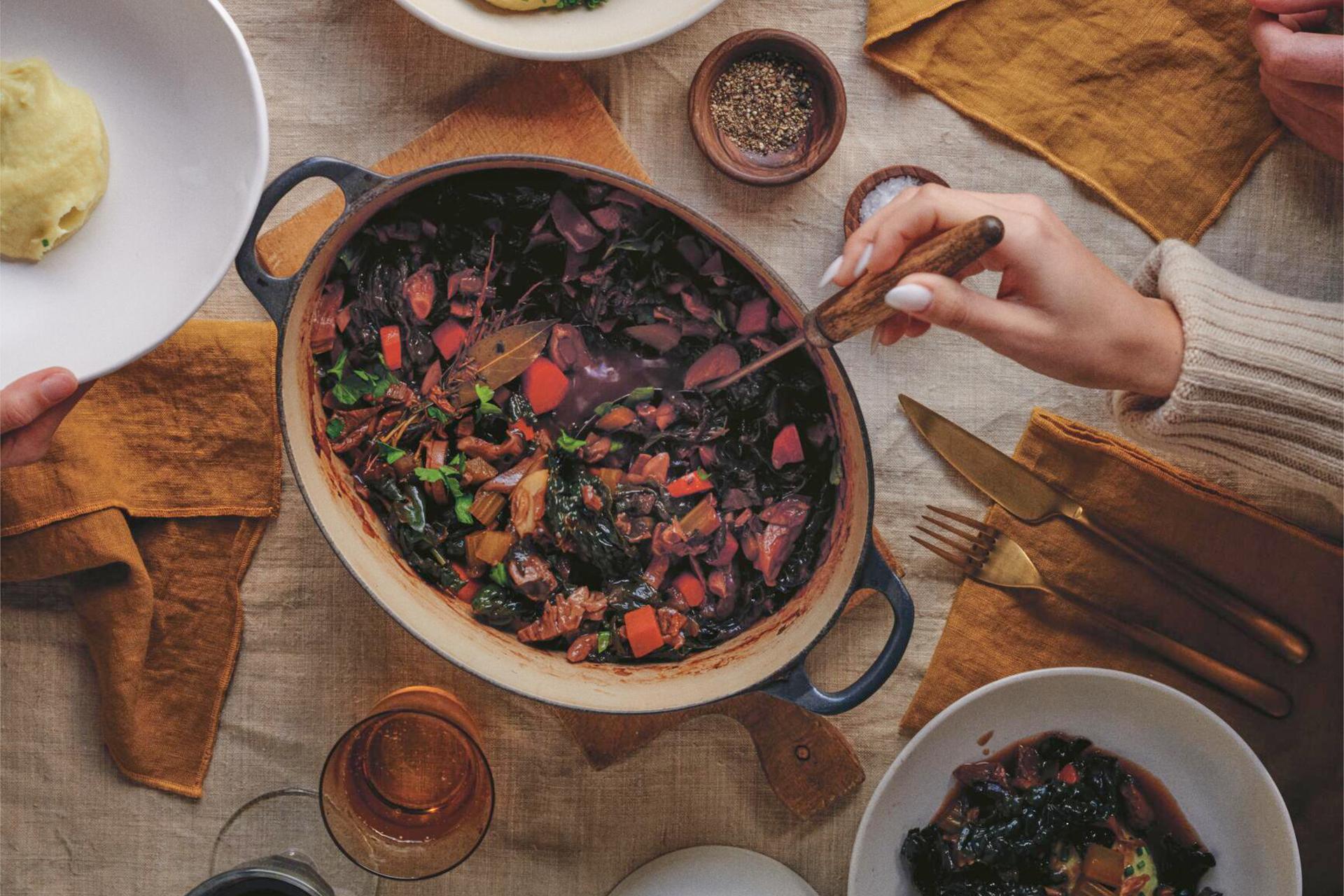 This image released by Voracious shows a recipe for vegetable bourguignon from the cookbook 