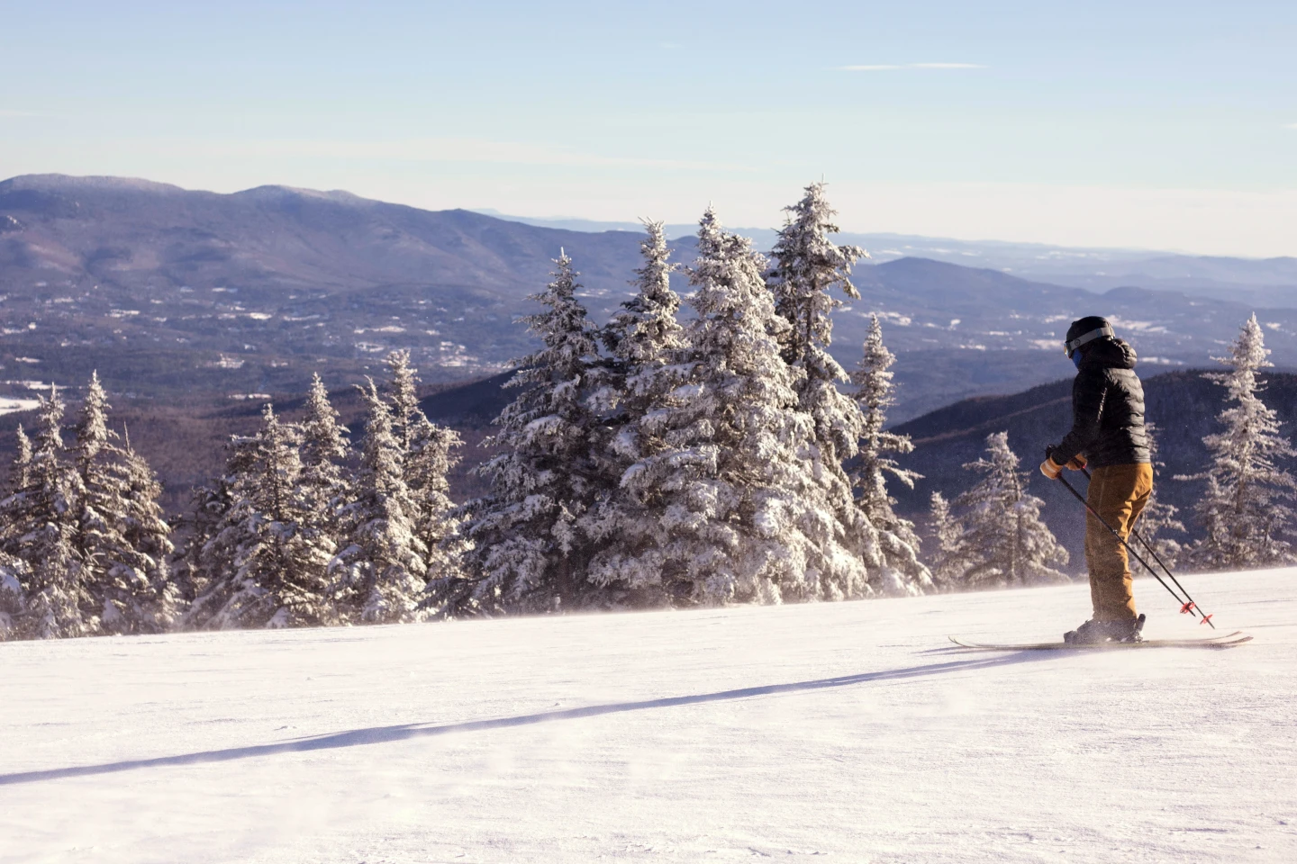 A skier moves down a crest at the Stowe Mountain Resort in Stowe, Vt., on Friday. (AP Photo/Amanda Swinhart)