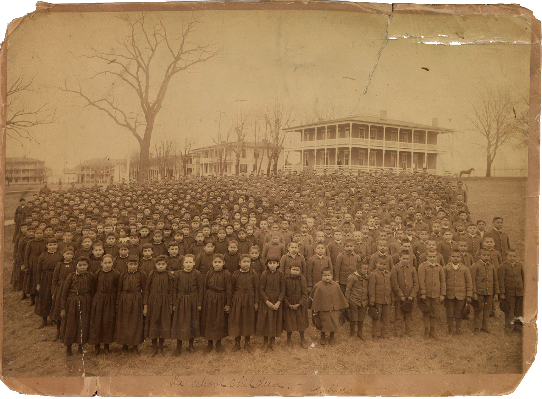 This photo provided by the Carlisle Indian School Digital Resource Center shows the 1892 student body of the Carlisle Indian Industrial School. (John N. Choate via AP)