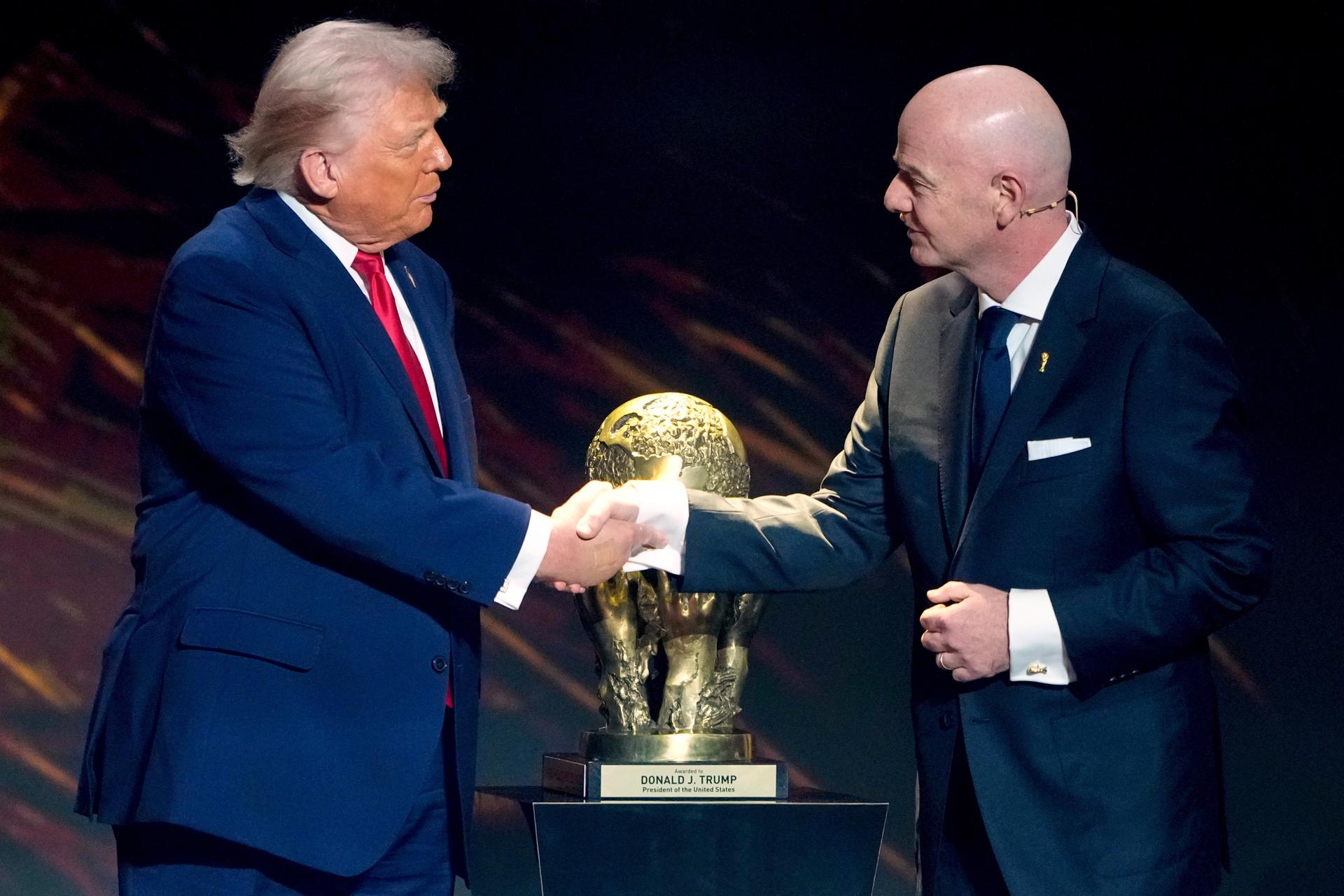 FIFA President Gianni Infantino awards President Donald Trump with the FIFA Peace Prize in Washington, 2025. 