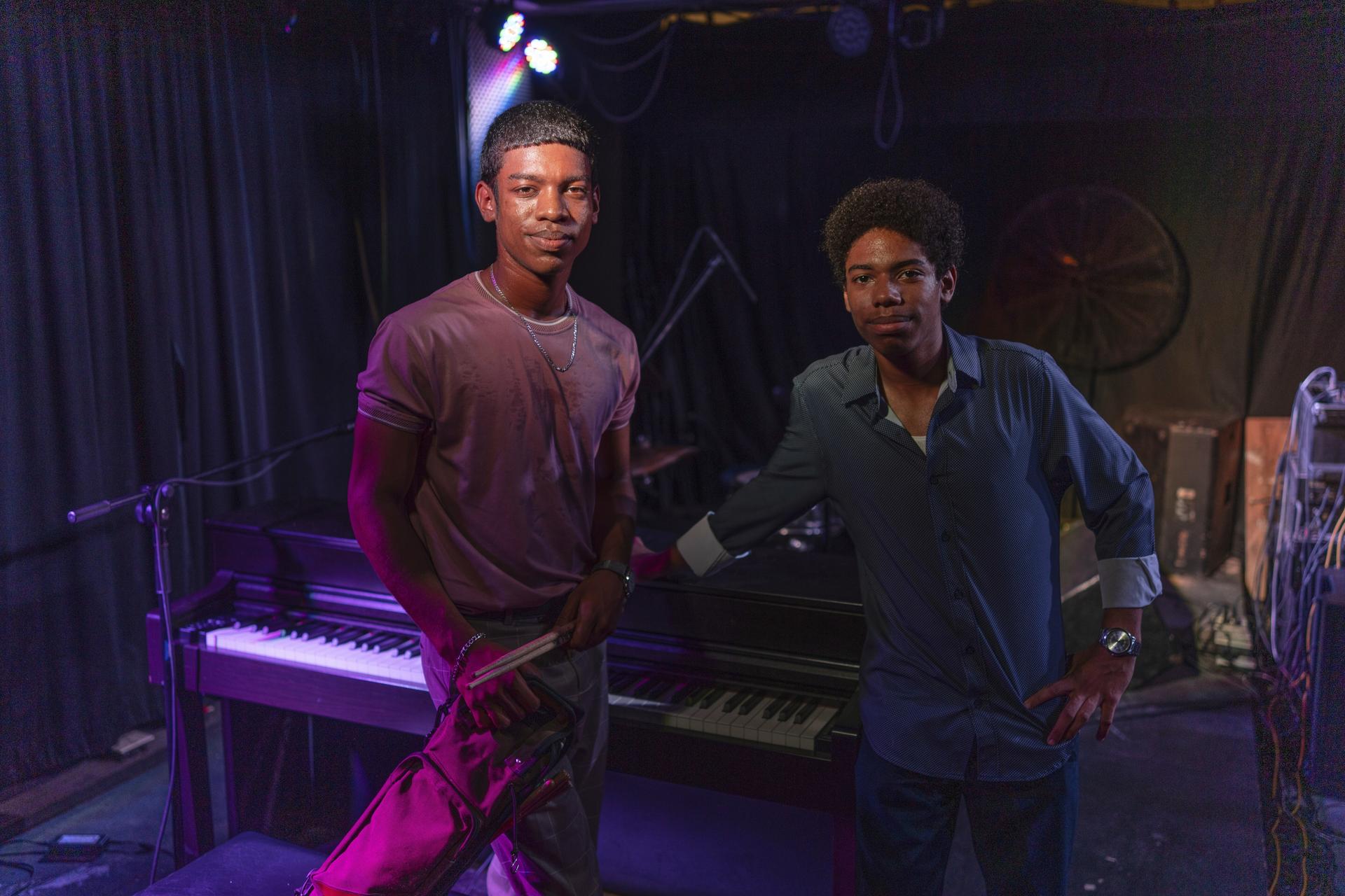 Fabio Abreu, left, and his brother Diego Abreu pose for a photo after their performance at La Fábrica de Arte Cubano, an art gallery and club in Havana, in August.