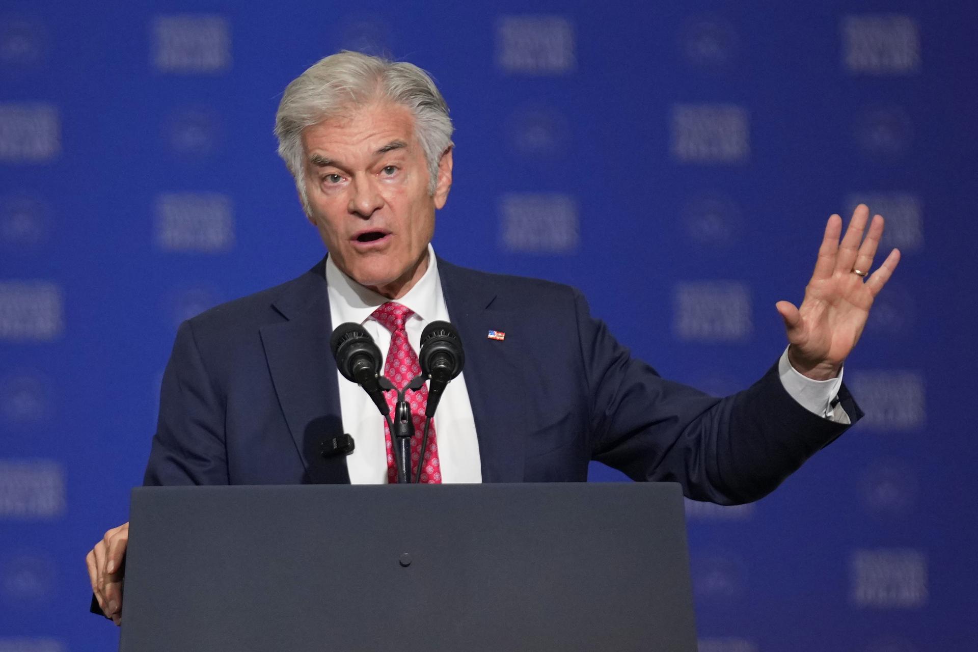 Administrator of the Centers for Medicare & Medicaid Services Dr. Mehmet Oz speaks at Milwaukee Mitchell International Airport, July 8, in Milwaukee. 