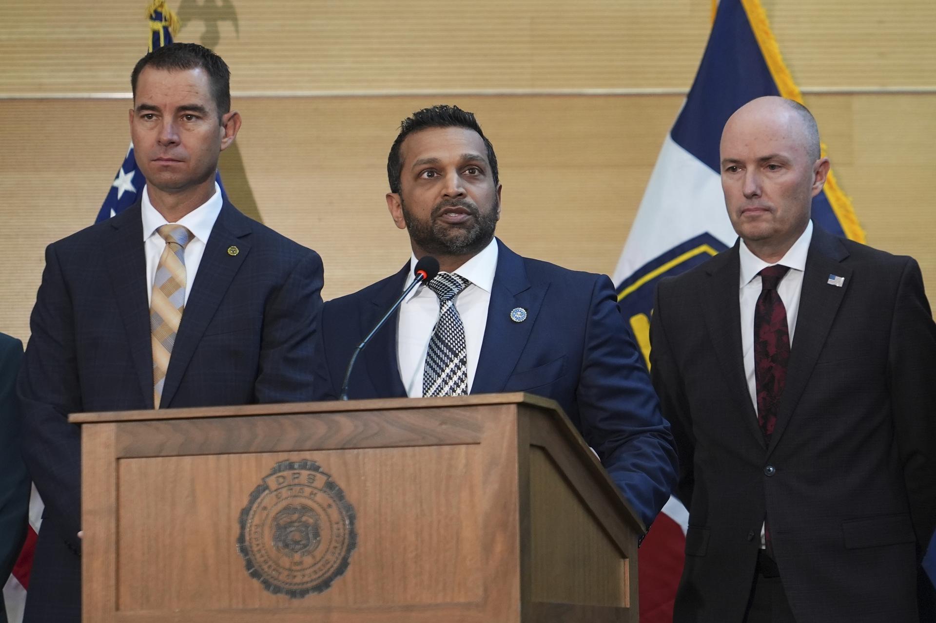Kash Patel speaks at a news conference on Friday in Orem, Utah, as Utah department of public safety commissioner Beau Mason, left, and Utah Gov. Spencer Cox listen. (AP Photo/Lindsey Wasson).