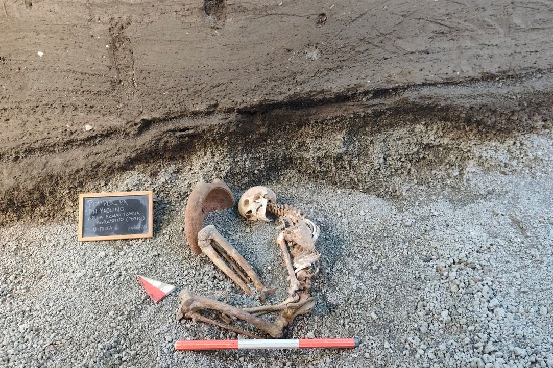 This image released by the Italian Culture Ministry on Monday shows a victim of the AD 79 eruption of Mount Vesuvius, in the Pompeii archaeological area near Naples. (Italian Culture Ministry via AP)