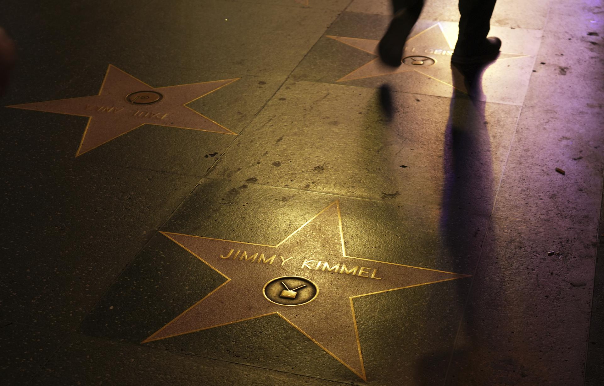 A pedestrian walks past Jimmy Kimmel's star on the Hollywood Walk of Fame in Los Angeles on Wednesday. (AP Photo/Chris Pizzello)