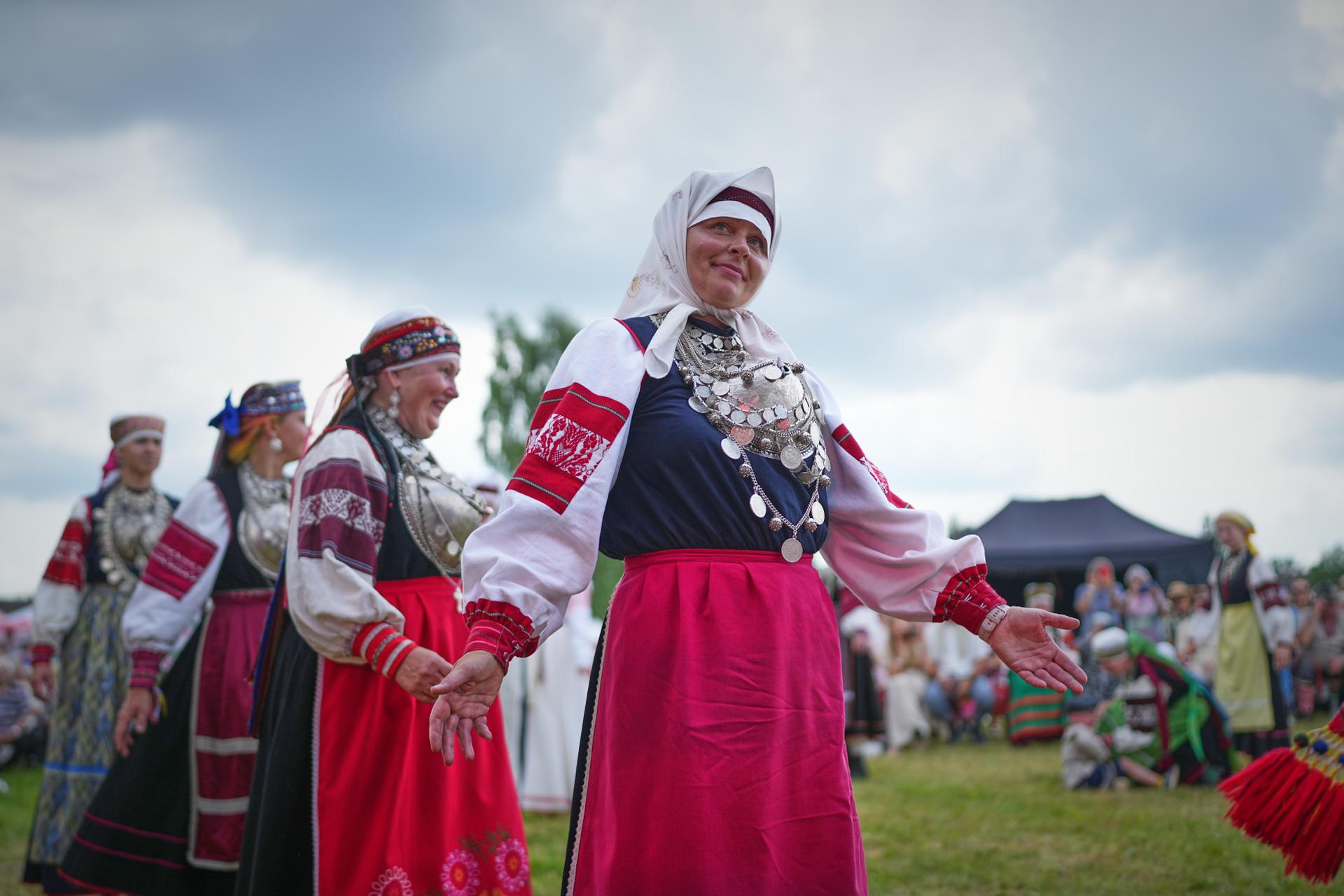 Women wearing traditional Seto costumes dance during the annual Seto Kingdom Day in Mikitamäe, south Estonia, Saturday.