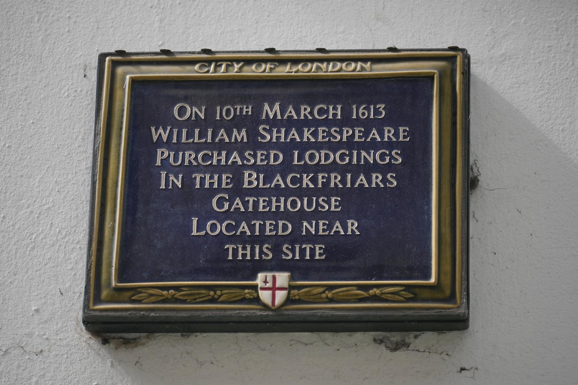 A plaque erected by the City of London to commemorate where William Shakespeare lived on a wall is pictured in London, Wednesday.