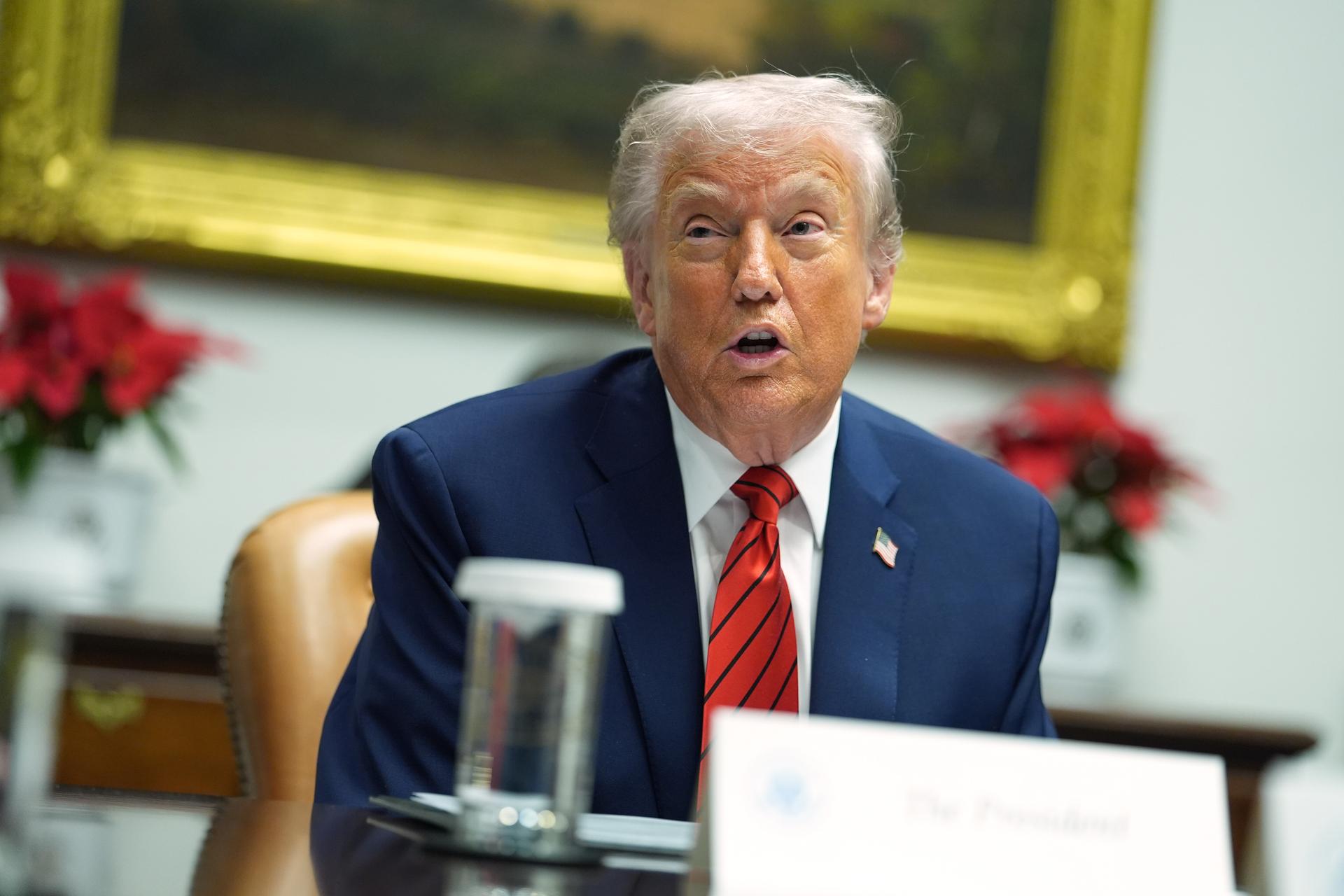 President Donald Trump speaks during a roundtable in the Roosevelt Room of the White House, Wednesday in Washington.