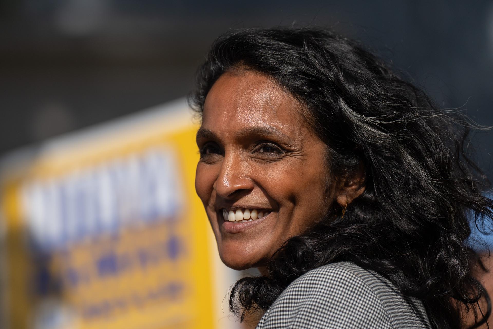 Nithya Raman, a candidate in the Los Angeles mayoral race, smiles during a campaign event discussing tenant protections with renters in Los Angeles, June 1.