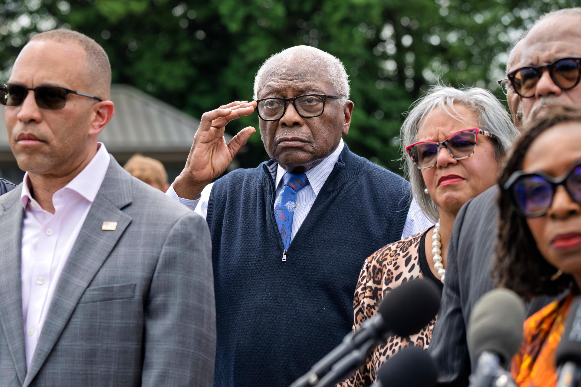 Rep. Jim Clyburn, D-S.C., center, joined by House Minority Leader Hakeem Jeffries, D-N.Y., left, stands with members of the Congressional Black Caucus during an event outside the Capitol on May 19. (AP Photo/J. Scott Applewhite)