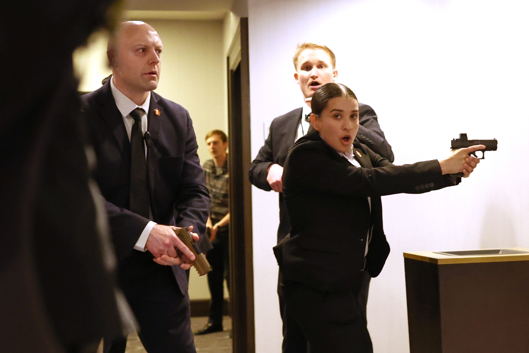 Secret service agents respond during the White House Correspondents Dinner on Saturday. (AP Photo/Tom Brenner)