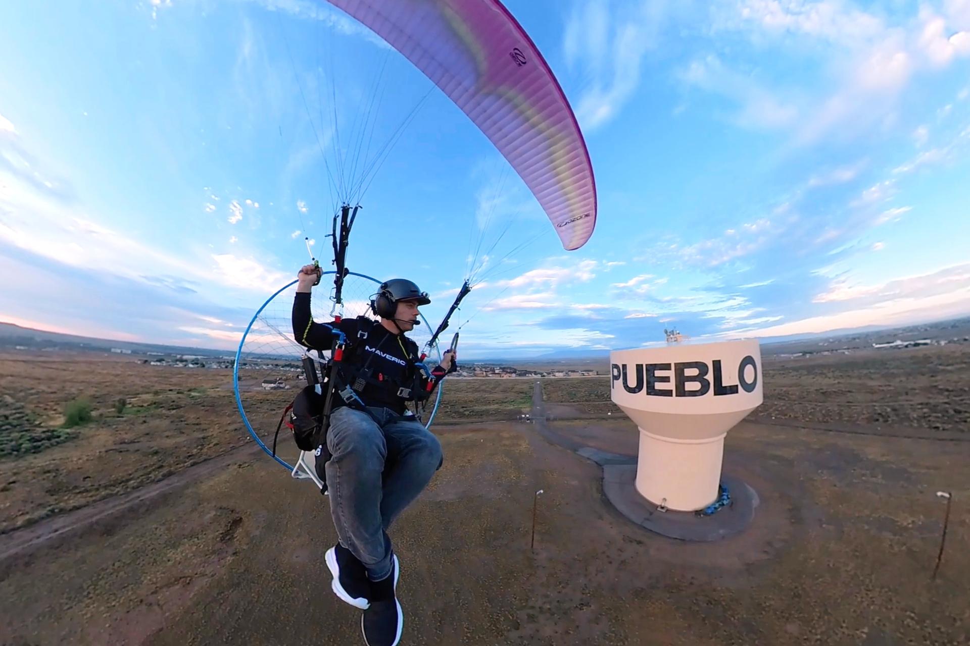 Hutzler flies his paramotor to work in Pueblo, Colo., in August. 