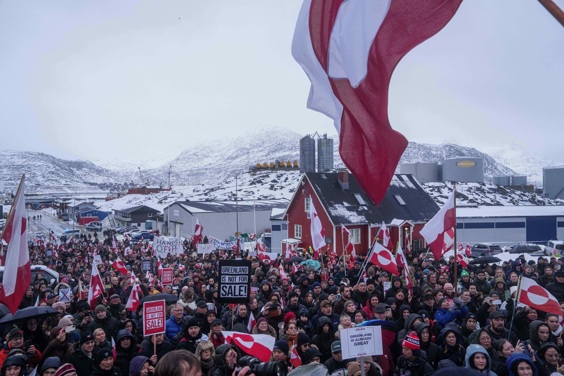 People protest against Trump's policy towards Greenland in front of the US consulate in Nuuk, Greenland, on Saturday. (AP Photo/Evgeniy Maloletka)