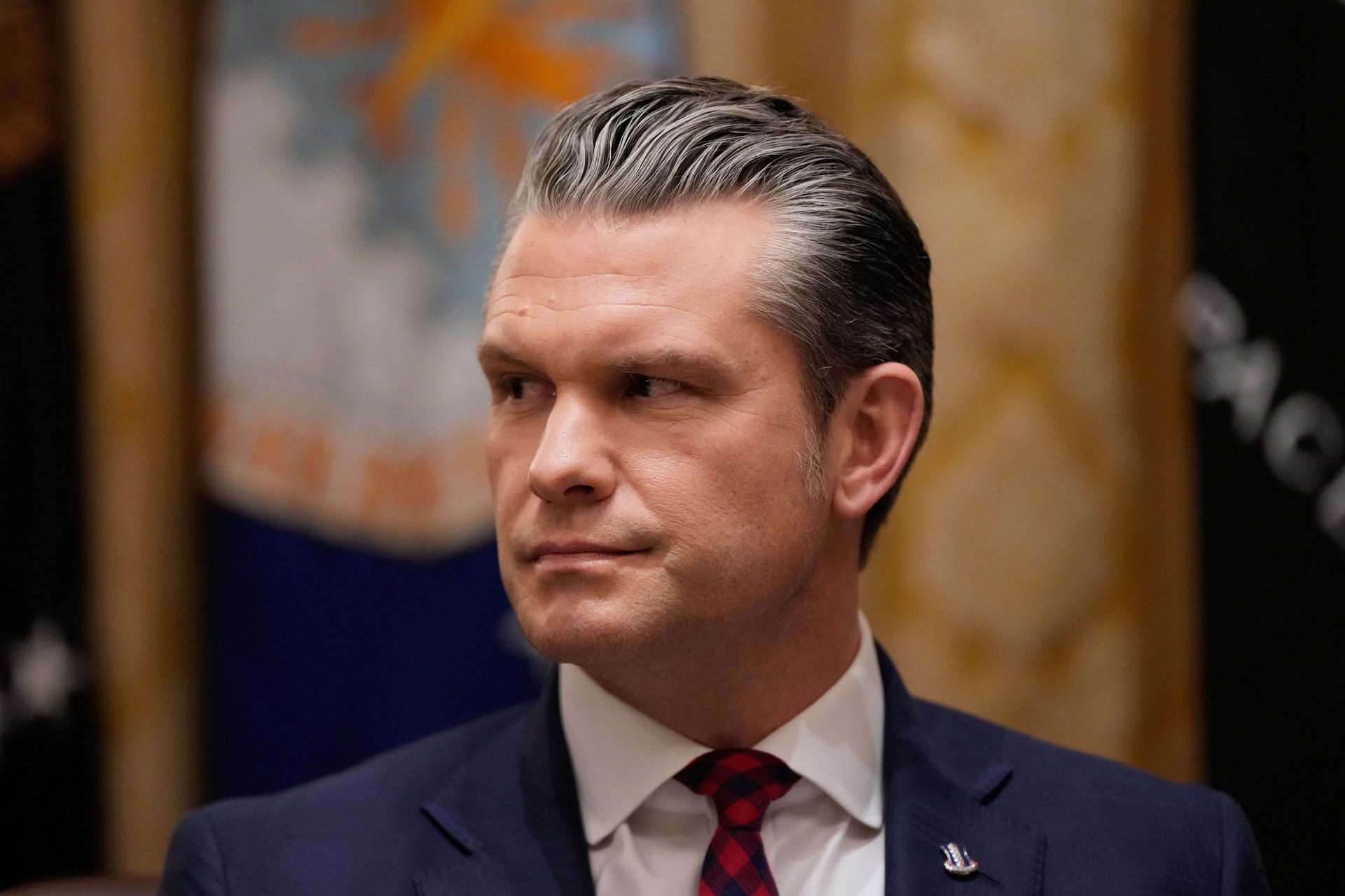 Defense Secretary Pete Hegseth listens during a Cabinet meeting at the White House on Tuesday. (AP Photo/Julia Demaree Nikhinson)