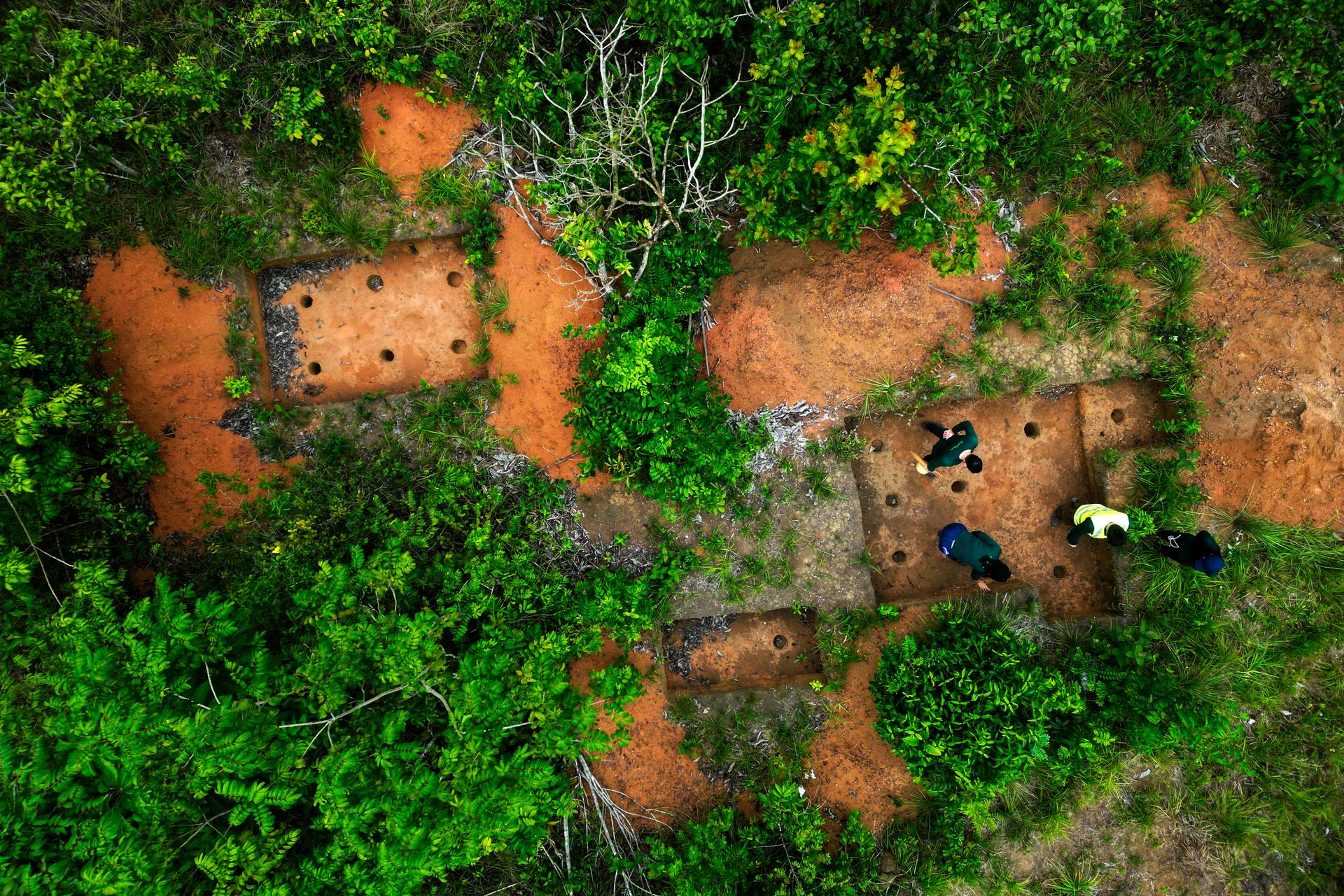 Archaeologists conduct a technical visit at the Quintela site in Santana, Amapa state, Brazil, in March. (AP Photo/Eraldo Peres)