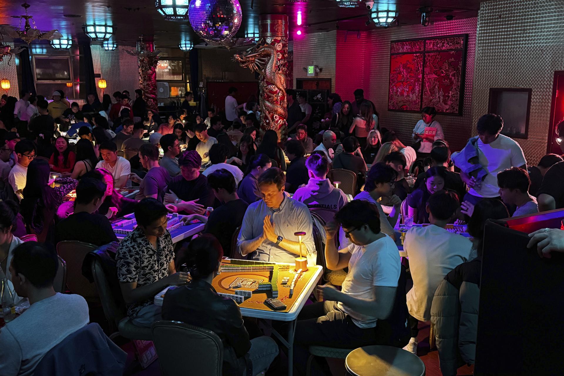 People play mahjong at an event organized by the YLL Mahjong Club, Aug. 15, in San Francisco. 