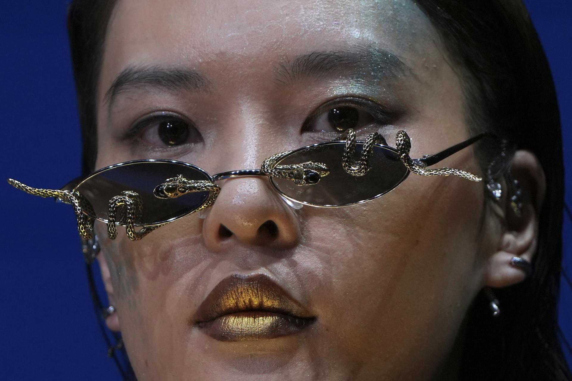 A model presents a creation by Maggie Ma collection during the SS2026 China Fashion Week on Tuesday. (AP Photo/Andy Wong)