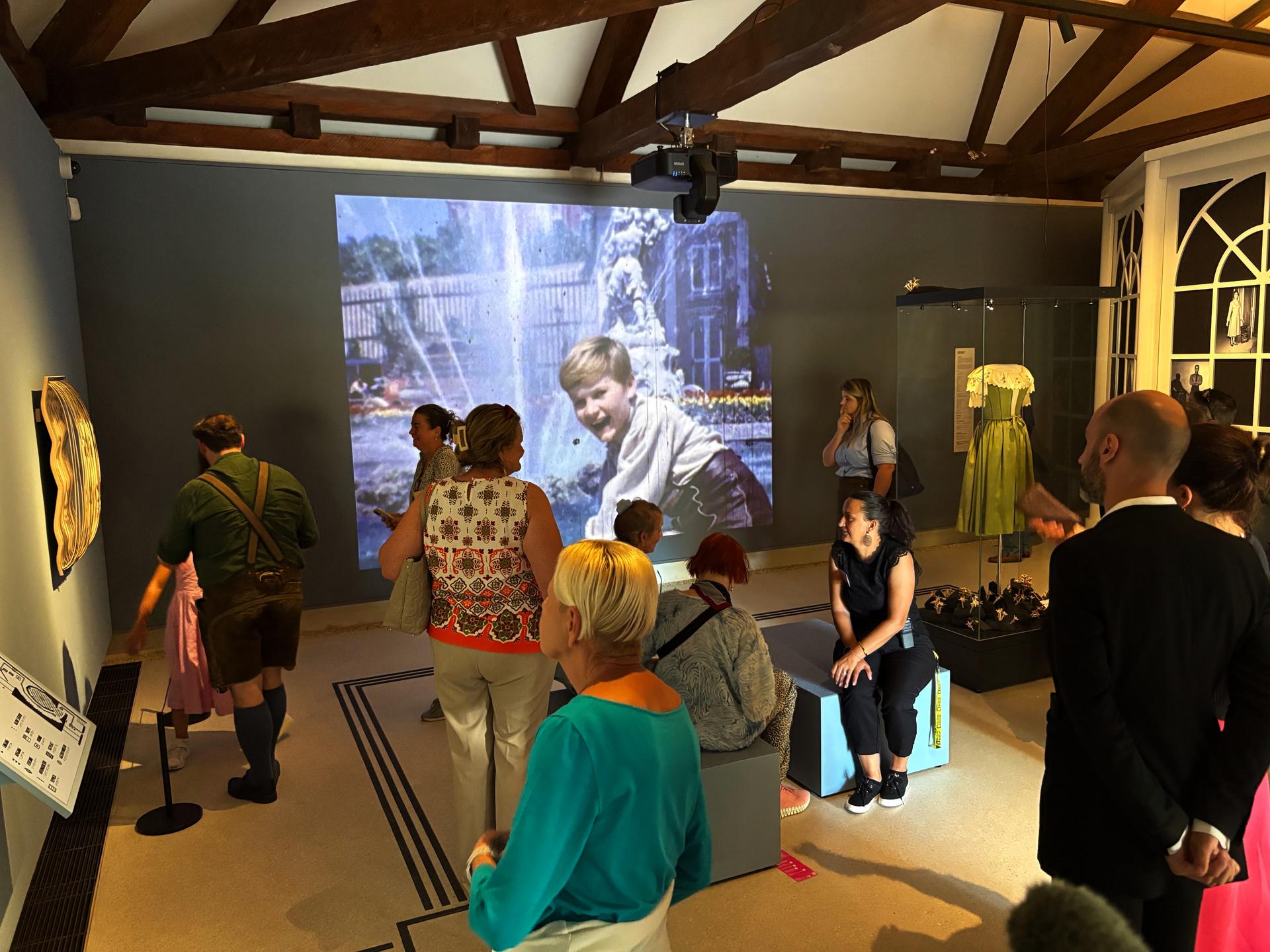 In this photo, people gather in the “Sound of Music Salzburg” museum in Salzburg, Austria, Sunday.