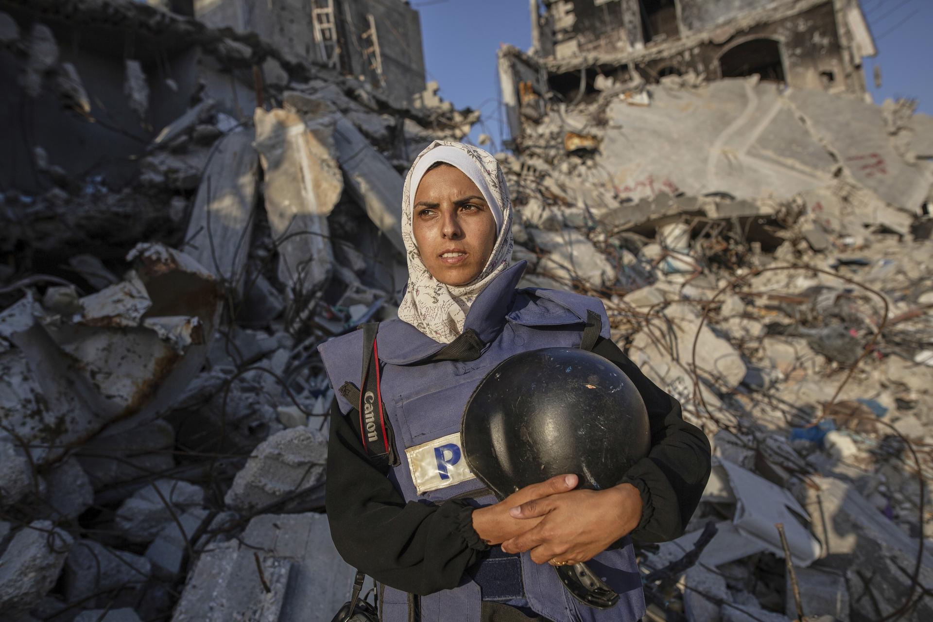 Freelance journalist Mariam Dagga poses for a portrait in Khan Younis, southern Gaza Strip, on June 14, 2024. (AP Photo/Jehad Alshrafi)