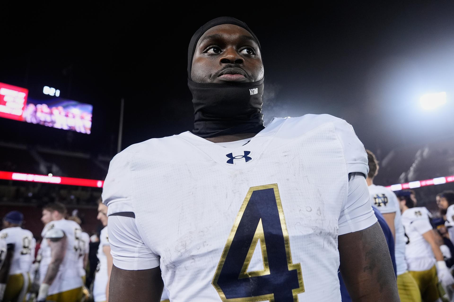 Notre Dame running back Jeremiyah Love walks off the field after the team's victory over Stanford in November. (AP Photo/Godofredo A. Vásquez)