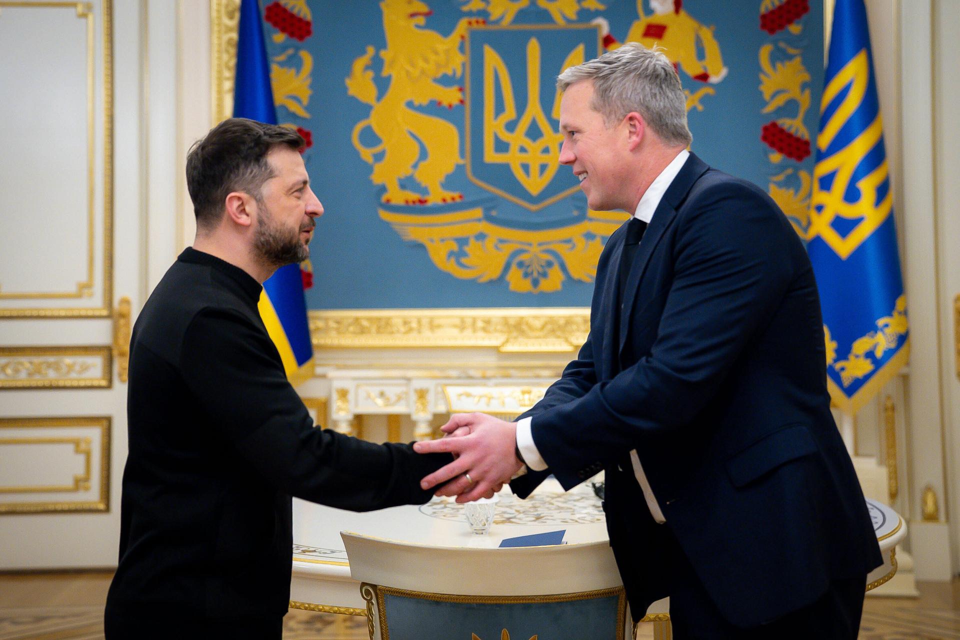In this photo provided by the Ukrainian Presidential Press Office, Ukrainian President Volodymyr Zelenskyy, left, shakes hands with U.S. Secretary of the Army Dan Driscoll in Kyiv, Ukraine, Thursday.