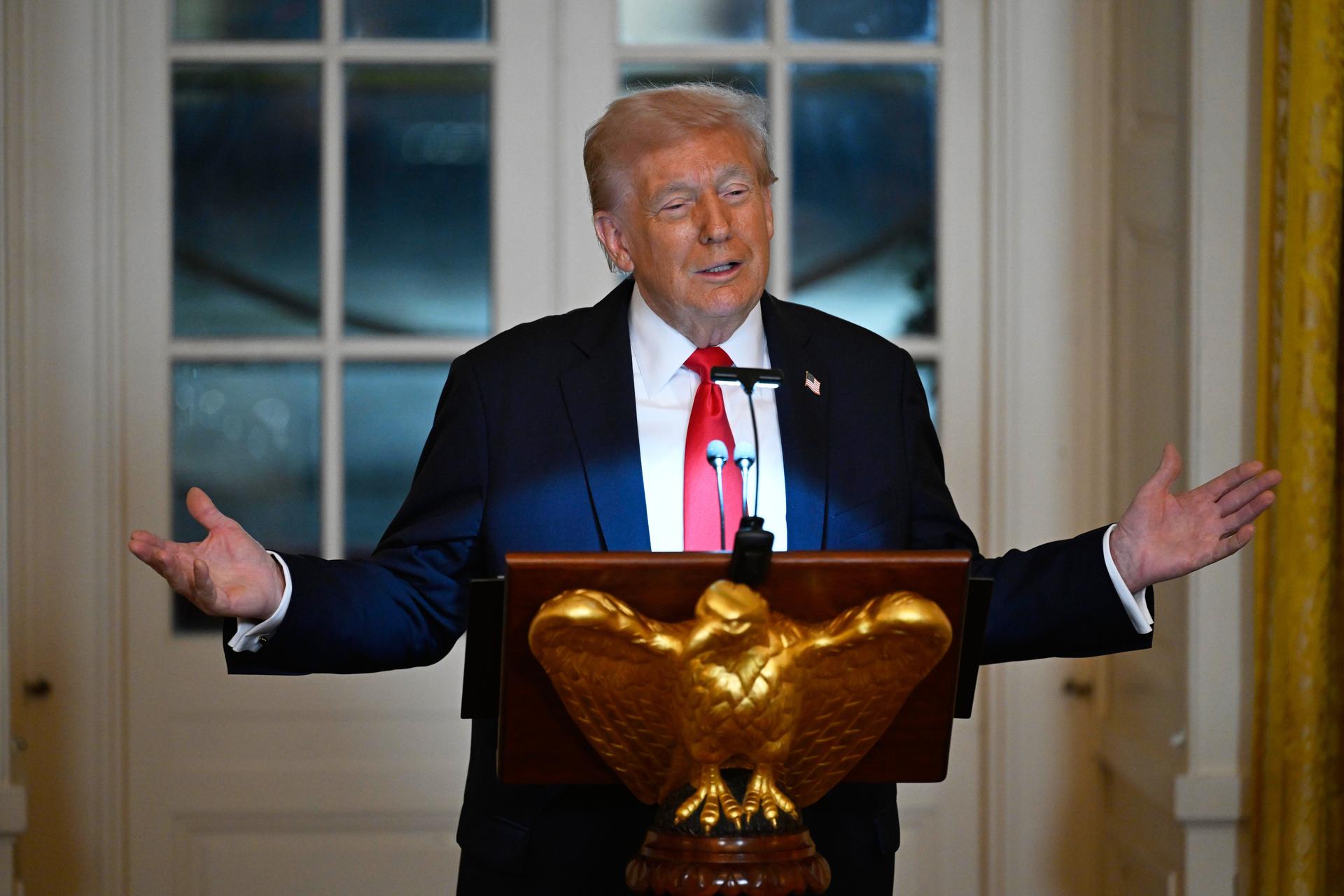 President Donald Trump addresses a dinner for donors who have contributed to build the new ballroom at the White House, Wednesday, in Washington. 