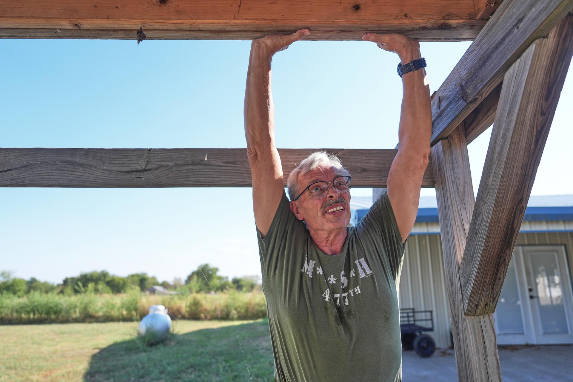 Ed Westrick, a registered Republican and veteran, said he isn’t sure he will cast a midterm ballot. He’s seen here at his rural home near Commerce, Texas, Friday.