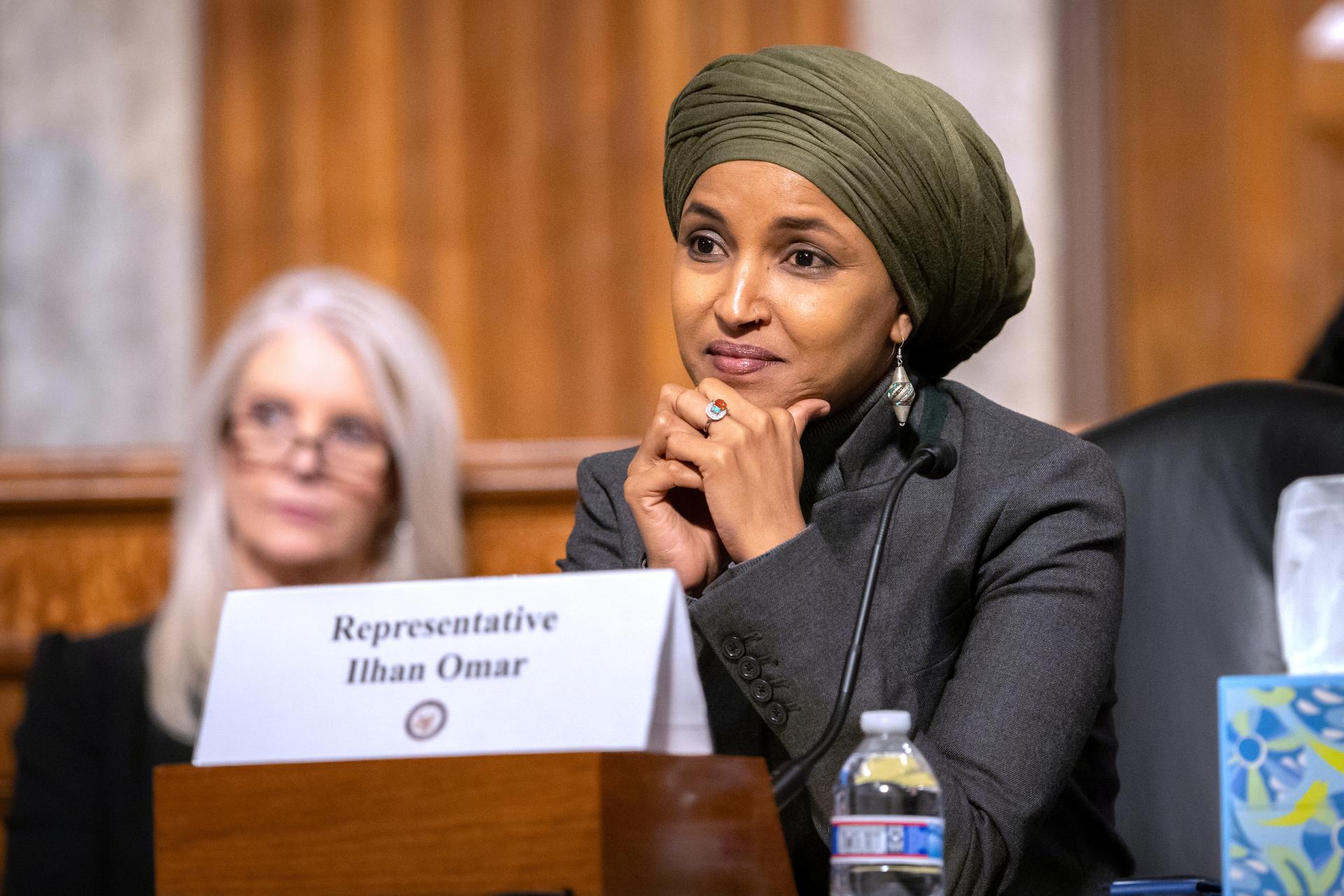 Rep. Ilhan Omar, D-Minn., listens during a Congressional spotlight hearing on Capitol Hill, in September, in Washington.
