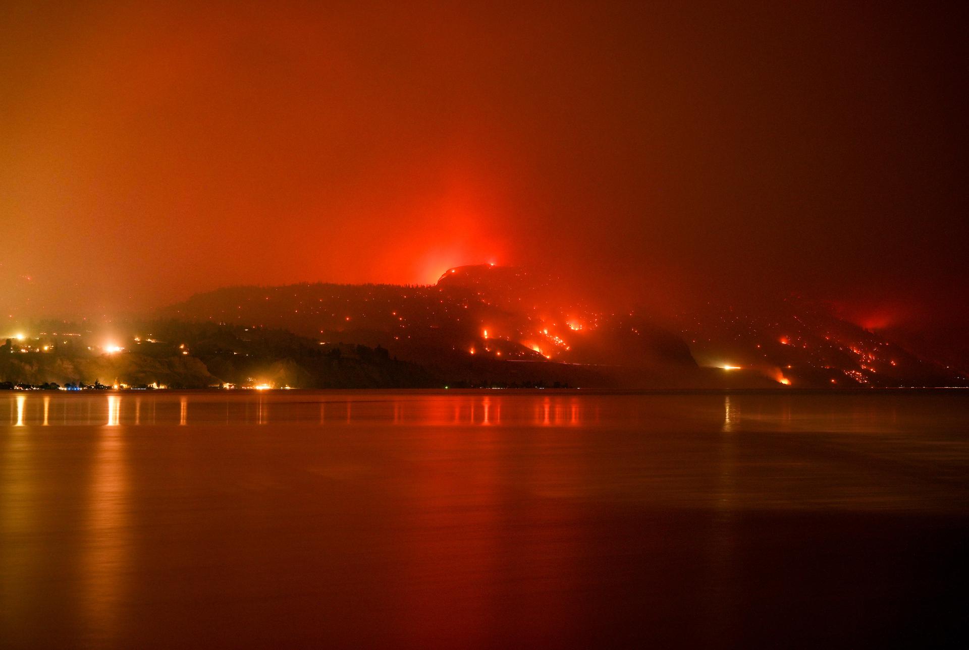 The Bald Range wildfire that has forced people out of their homes in the south Okanagan region, burns in Summerland, B.C., late Saturday.
