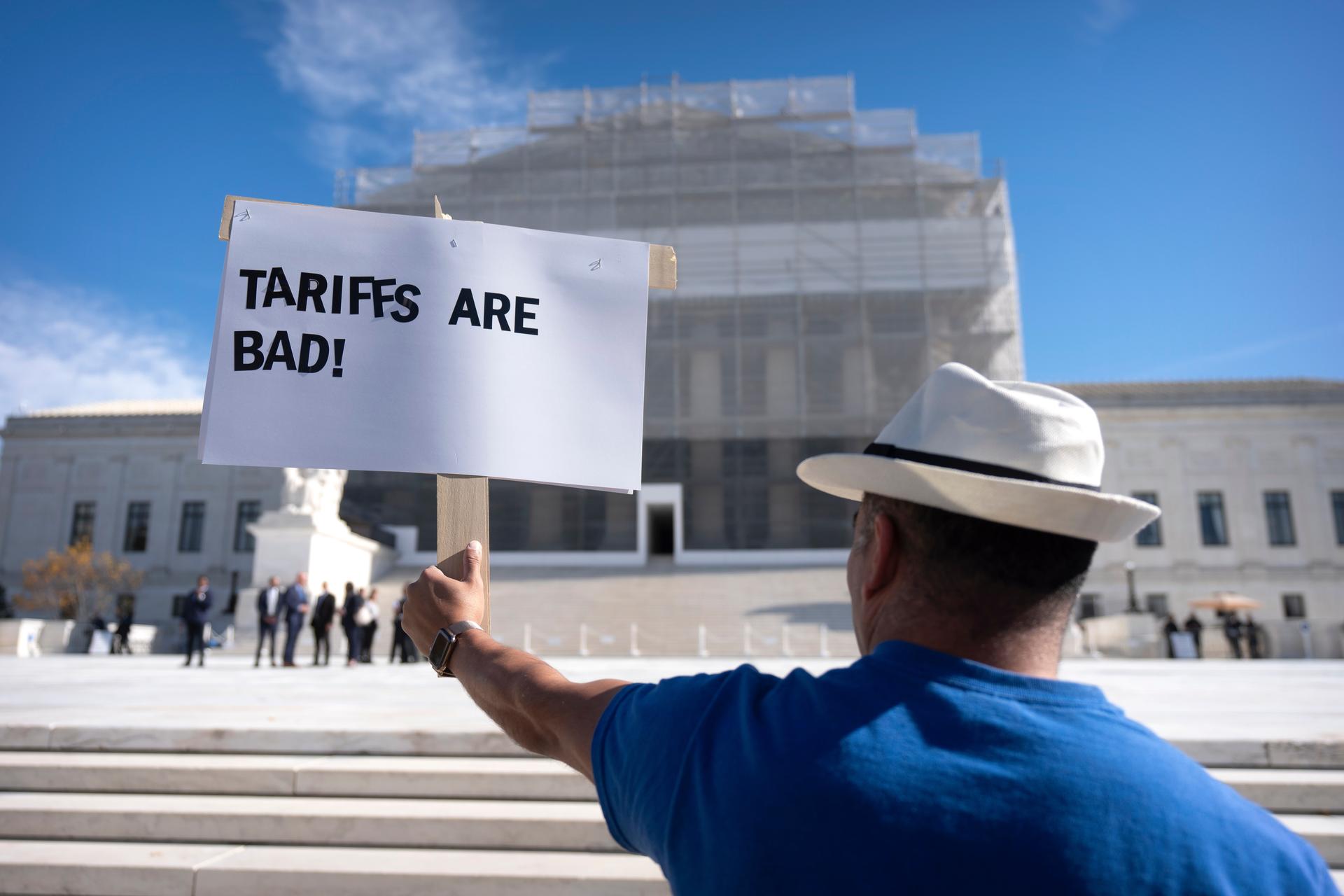A demonstrator protests outside the Supreme Court on Wednesday. (AP Photo/Mark Schiefelbein)