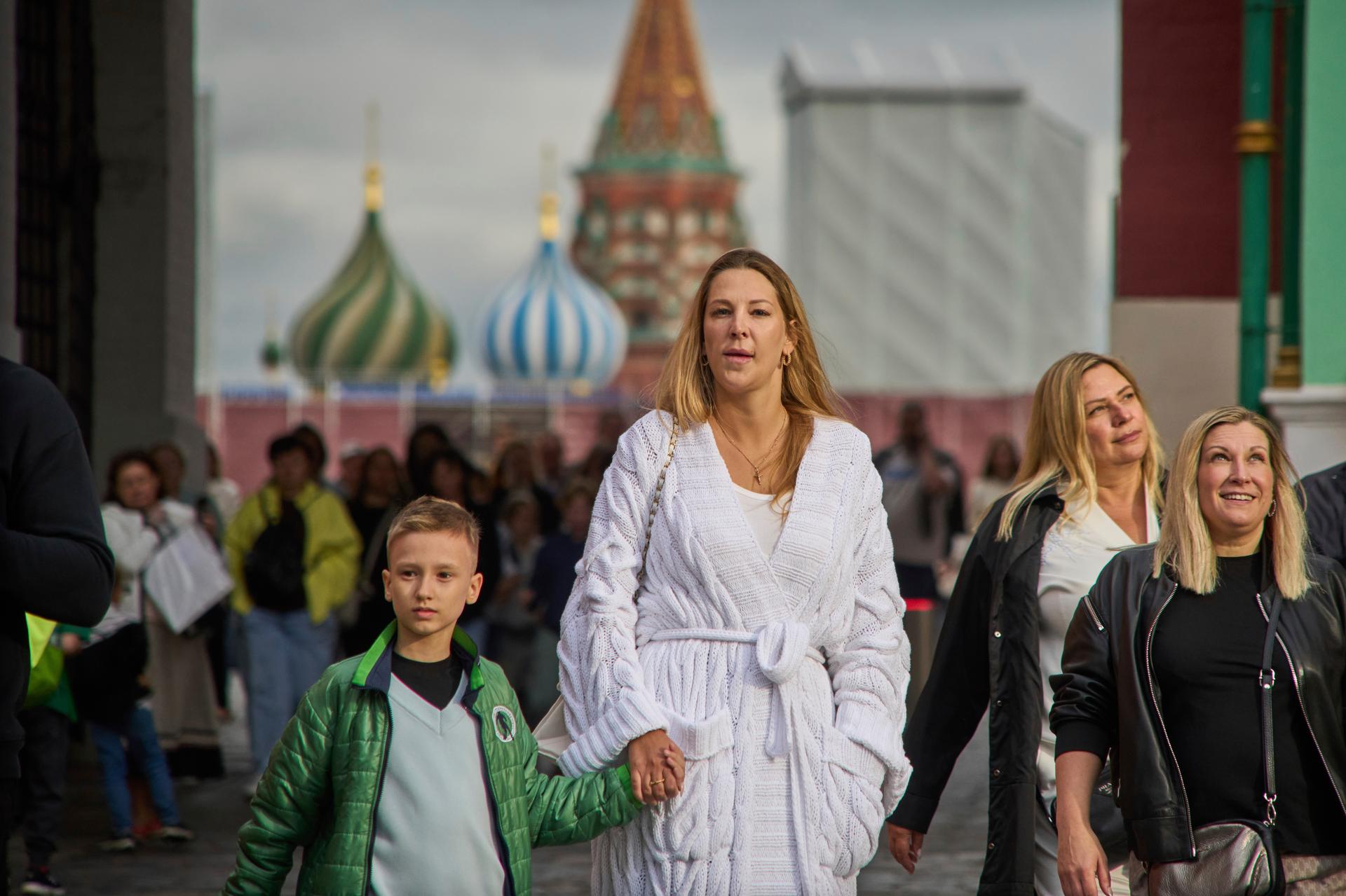 People walk from Red Square with St. Basil's Cathedral in the background in Moscow, Russia, in Aug. 2025. (AP Photo/Alexander Zemlianichenko)