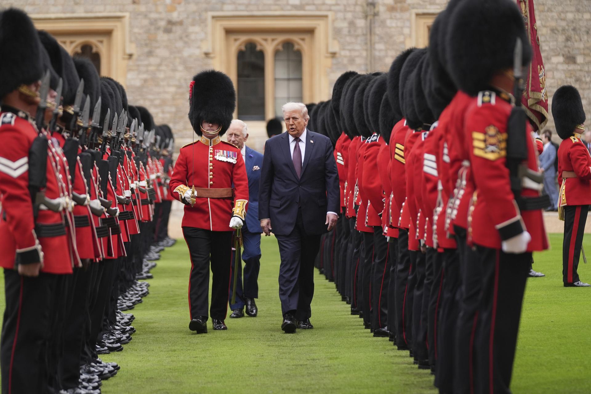President Donald Trump and Britain's King Charles III inspect the guard of honor during an arrival ceremony at Windsor Castle on Wednesday. (AP Photo/Evan Vucci)