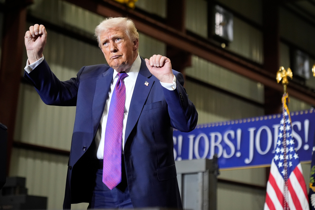 President Donald Trump dances after speaking at a rally at Coosa Steel Corporation in Rome, Ga.