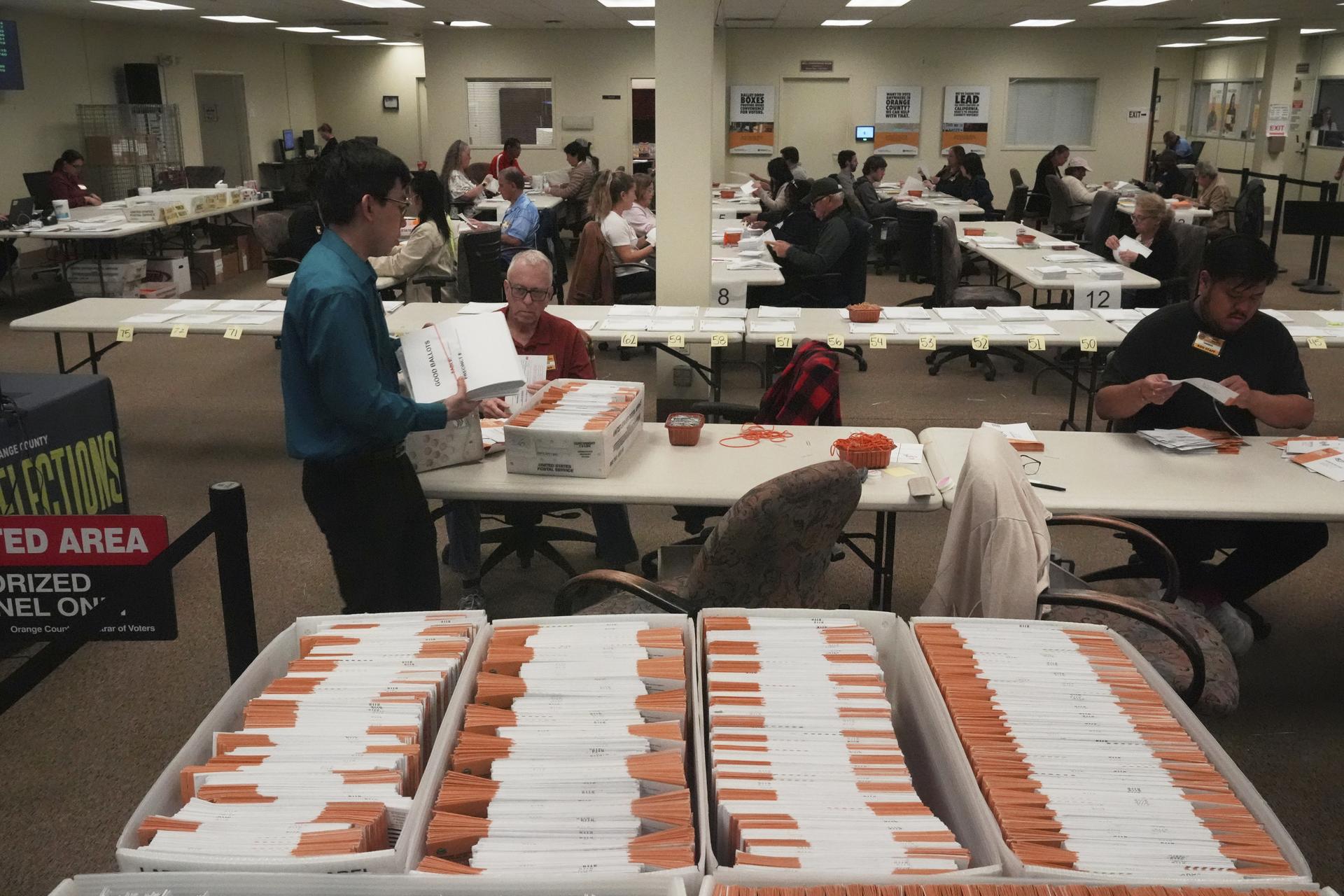 Ballots for the statewide special election are sorted at the Orange County Registrar of Voters office in Santa Ana, Calif.