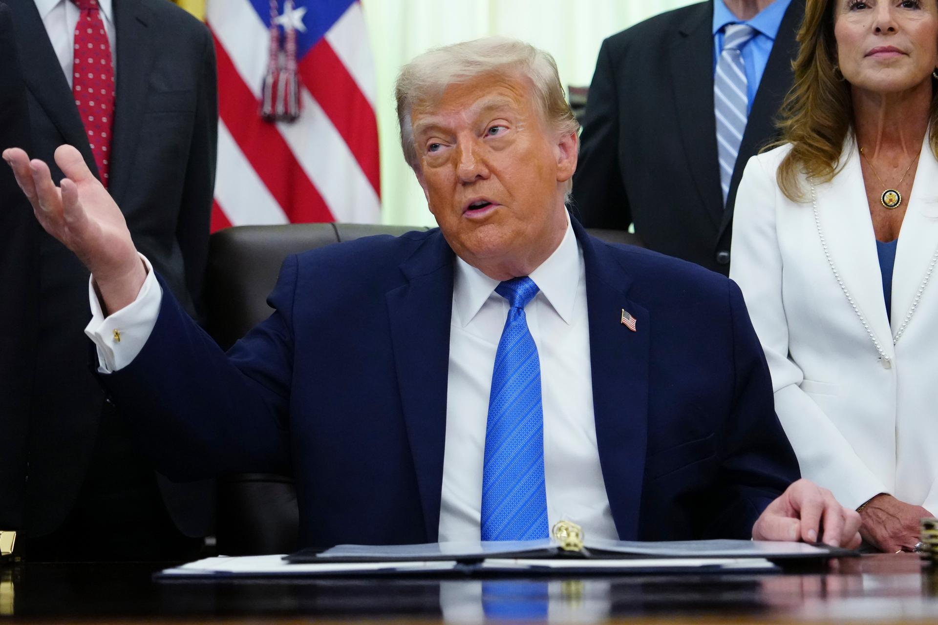 President Donald Trump speaks in the Oval Office of the White House, Wednesday, in Washington. 