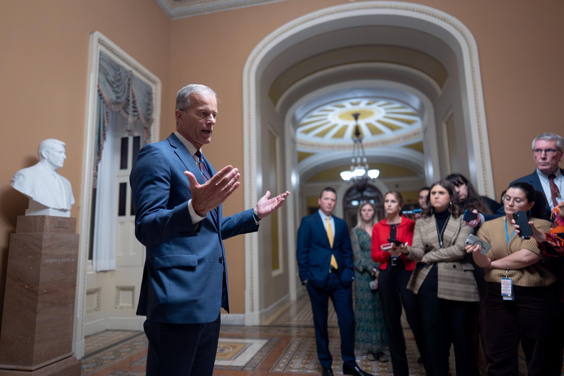 Senate Majority Leader John Thune, R-S.D., speaks to reporters after final Senate passage of the stopgap funding bill to reopen the government through Jan. 30, at the Capitol in Washington, Monday.