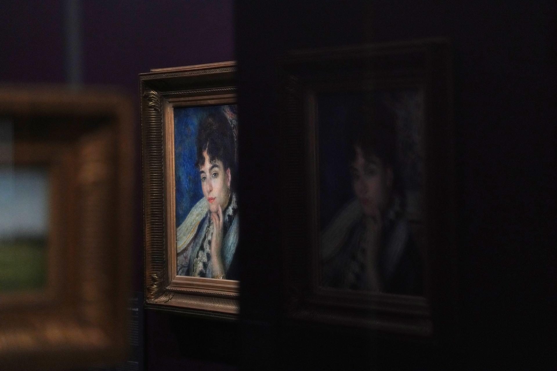 French painter Pierre-Auguste Renoir's painting titled Madame Alphonse Daudet is on exhibit at the Musée d'Orsay museum in Paris on Monday. (AP Photo/Thibault Camus)